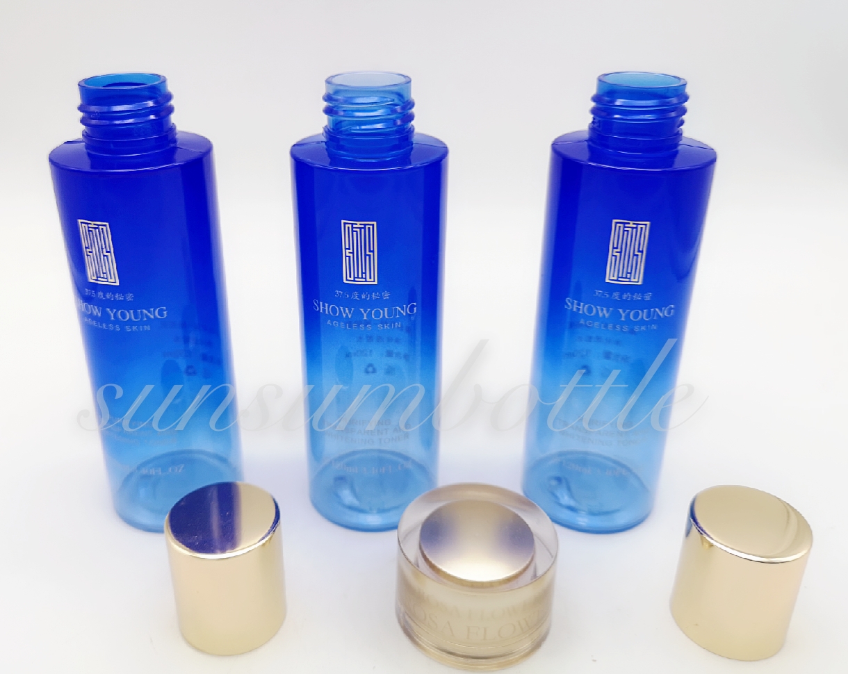 Blue toner bottle with golden lid